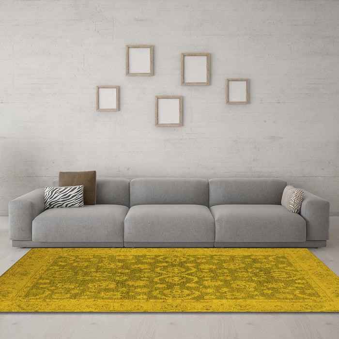 Machine Washable Oriental Yellow Traditional Rug in a Living Room, wshurb1005yw