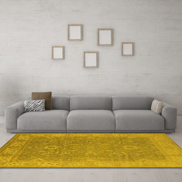 Machine Washable Oriental Yellow Industrial Rug in a Living Room, wshurb1009yw