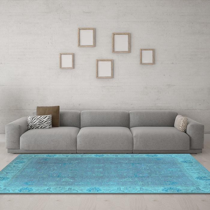 Machine Washable Oriental Light Blue Traditional Rug in a Living Room, wshurb1051lblu