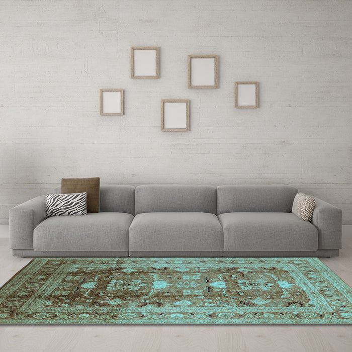 Machine Washable Oriental Light Blue Traditional Rug in a Living Room, wshurb1055lblu