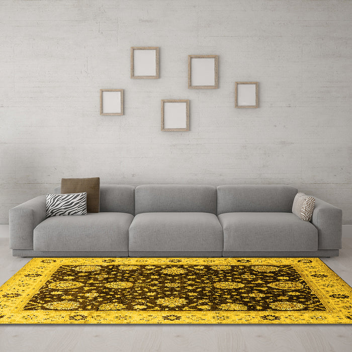Machine Washable Oriental Yellow Traditional Rug in a Living Room, wshurb1056yw