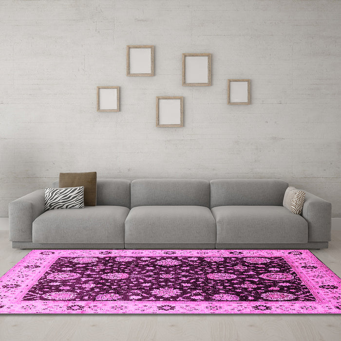 Machine Washable Oriental Pink Traditional Rug in a Living Room, wshurb1056pnk