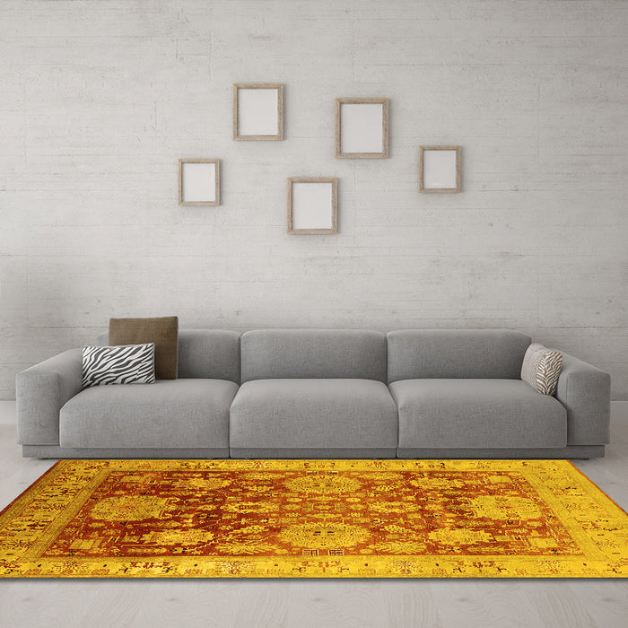 Machine Washable Oriental Yellow Traditional Rug in a Living Room, wshurb1058yw