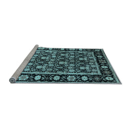 Sideview of Machine Washable Oriental Light Blue Traditional Rug, wshurb1060lblu