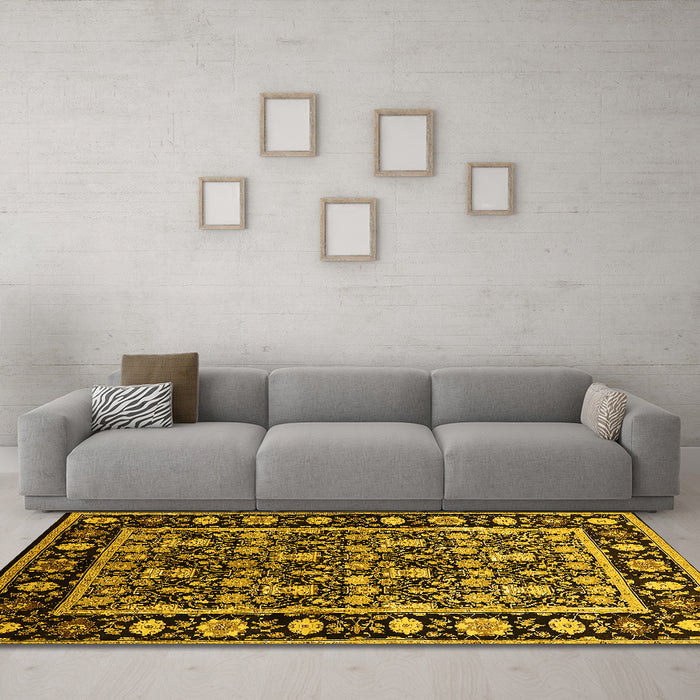Machine Washable Oriental Yellow Traditional Rug in a Living Room, wshurb1060yw