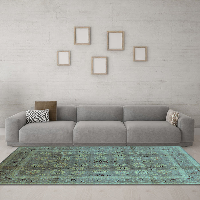 Machine Washable Oriental Light Blue Traditional Rug in a Living Room, wshurb1061lblu