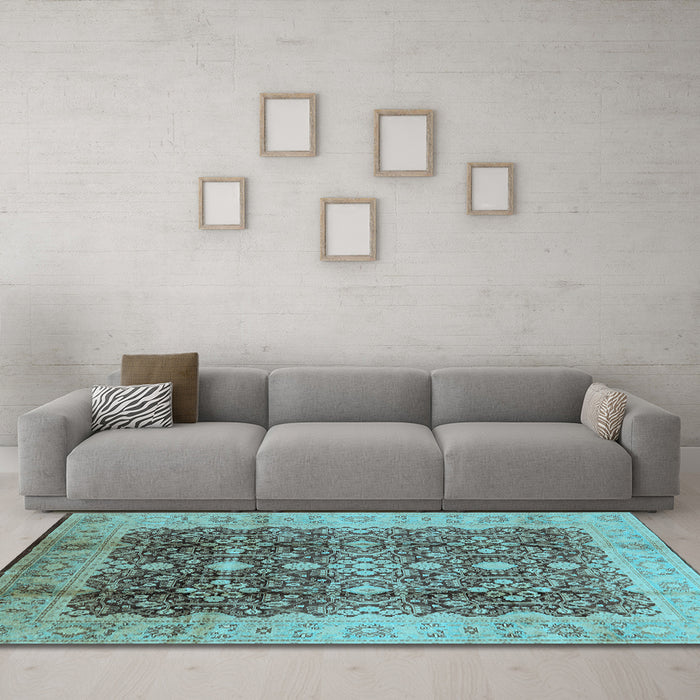 Machine Washable Oriental Light Blue Traditional Rug in a Living Room, wshurb1062lblu