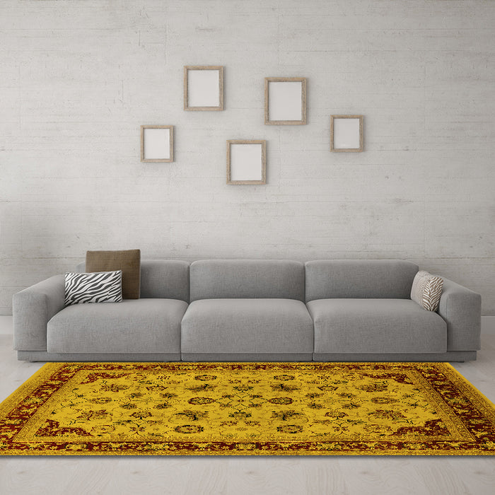 Machine Washable Oriental Yellow Traditional Rug in a Living Room, wshurb1065yw
