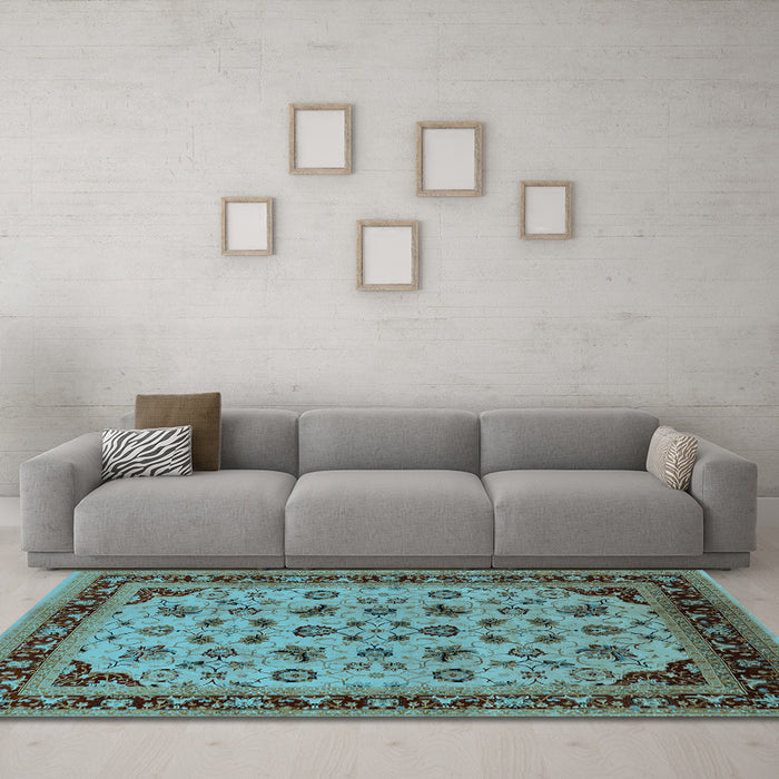 Machine Washable Oriental Light Blue Traditional Rug in a Living Room, wshurb1065lblu