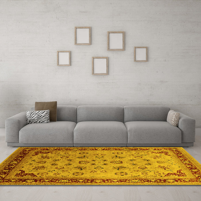 Machine Washable Oriental Yellow Traditional Rug in a Living Room, wshurb1069yw