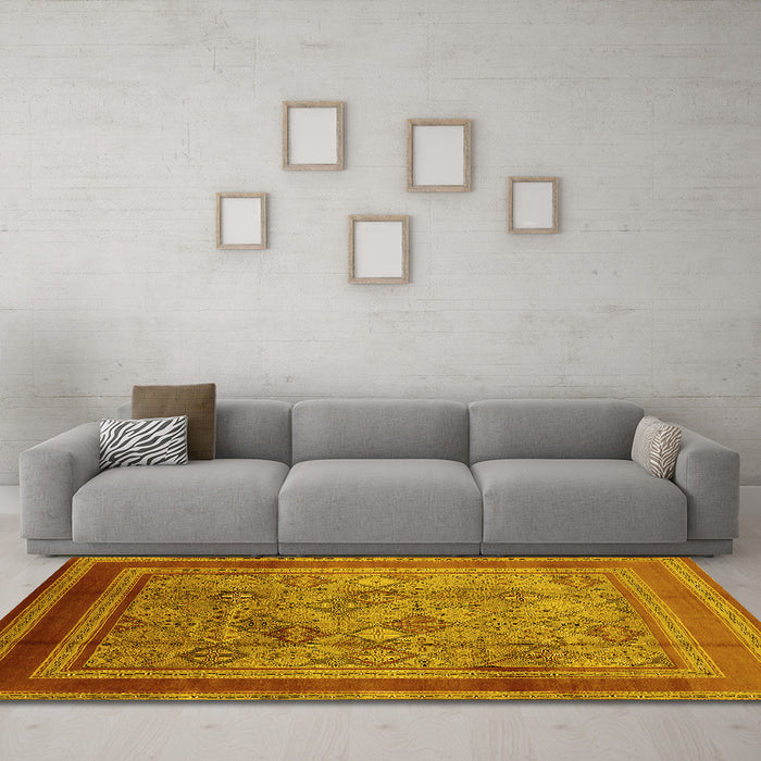 Machine Washable Oriental Yellow Industrial Rug in a Living Room, wshurb1070yw