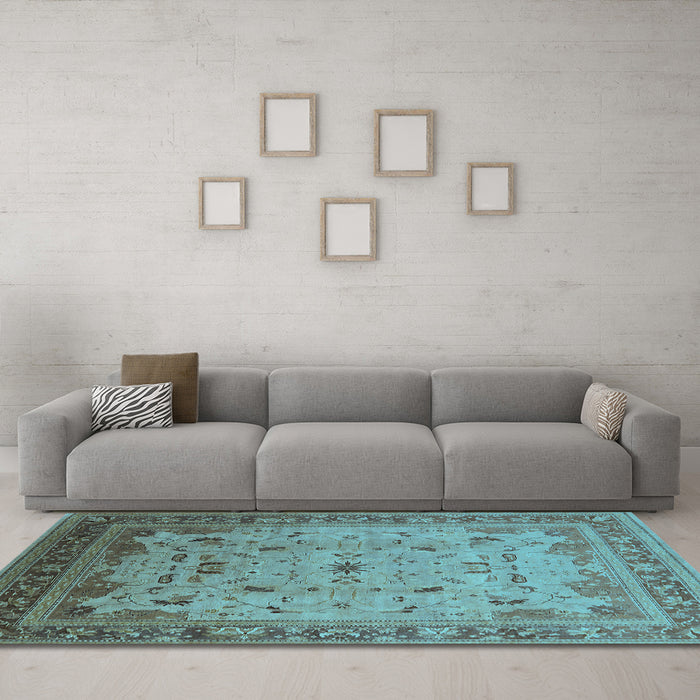 Machine Washable Oriental Light Blue Traditional Rug in a Living Room, wshurb1072lblu
