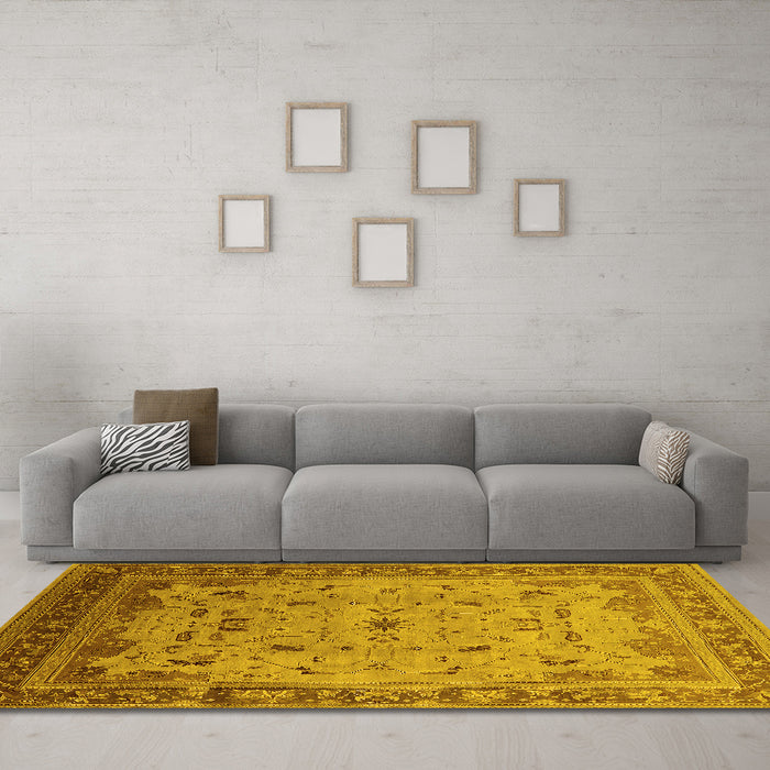 Machine Washable Oriental Yellow Traditional Rug in a Living Room, wshurb1072yw