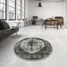 Round Mid-Century Modern Charcoal Gray Oriental Rug in a Office, urb1075