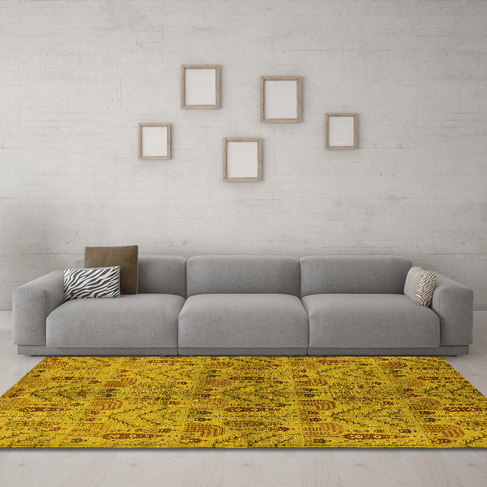 Machine Washable Oriental Yellow Industrial Rug in a Living Room, wshurb1106yw