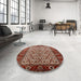 Round Mid-Century Modern Red Oriental Rug in a Office, urb1154