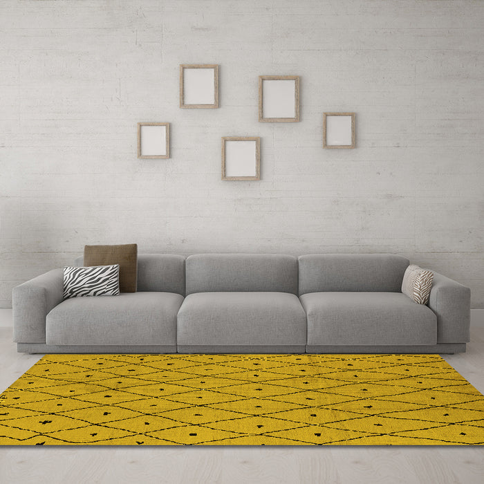 Machine Washable Solid Yellow Modern Rug in a Living Room, wshurb1160yw