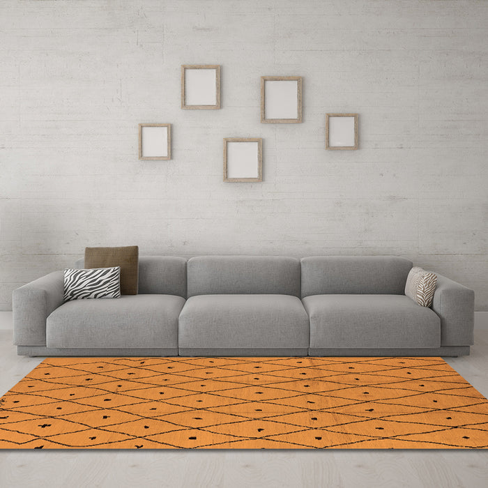 Machine Washable Solid Orange Modern Area Rugs in a Living Room, wshurb1160org