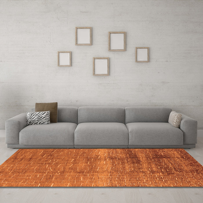 Machine Washable Solid Orange Modern Area Rugs in a Living Room, wshurb1164org