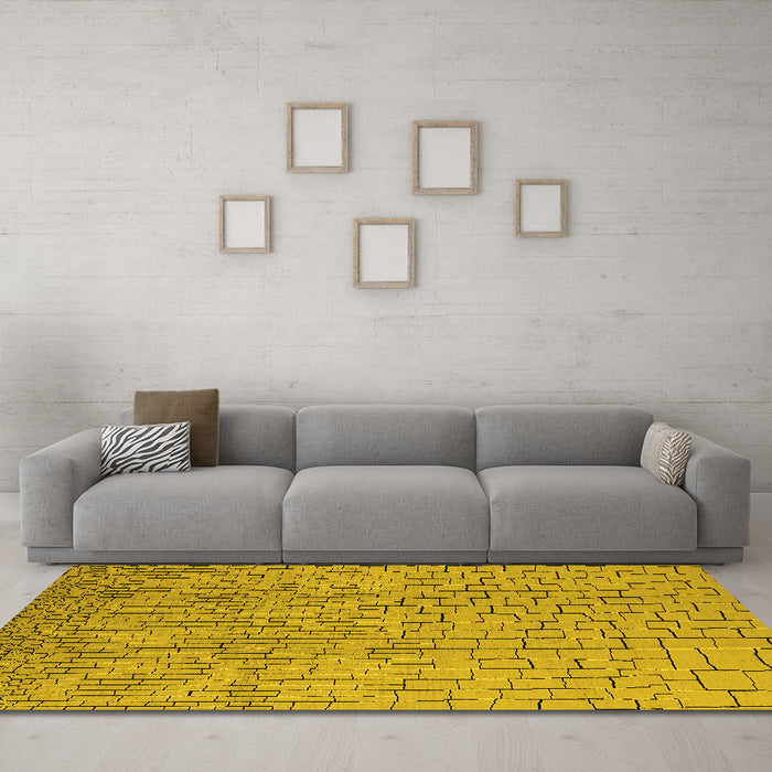 Machine Washable Solid Yellow Modern Rug in a Living Room, wshurb1176yw