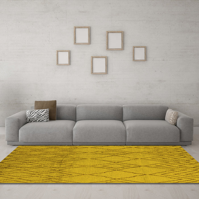 Machine Washable Solid Yellow Modern Rug in a Living Room, wshurb1177yw
