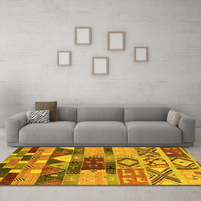 Machine Washable Oriental Yellow Industrial Rug in a Living Room, wshurb1181yw