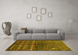 Machine Washable Solid Yellow Modern Rug in a Living Room, wshurb1183yw