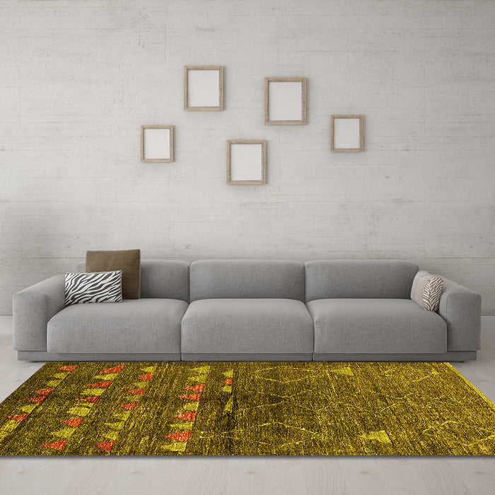 Machine Washable Solid Yellow Modern Rug in a Living Room, wshurb1183yw