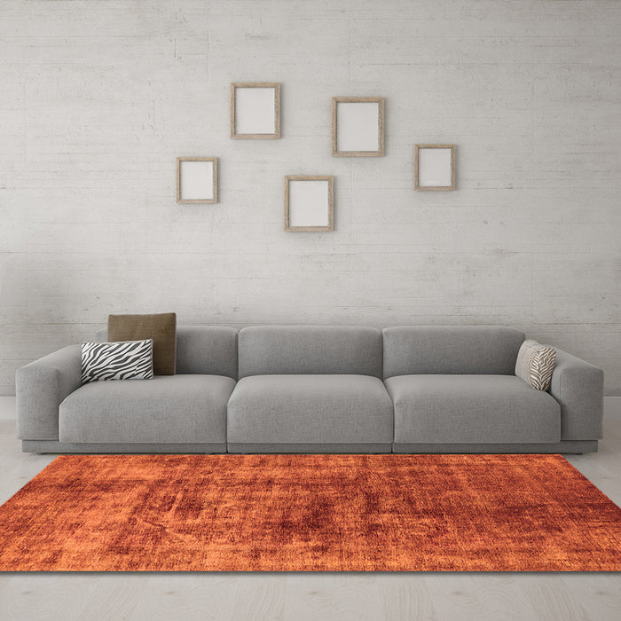 Machine Washable Solid Orange Modern Area Rugs in a Living Room, wshurb1185org