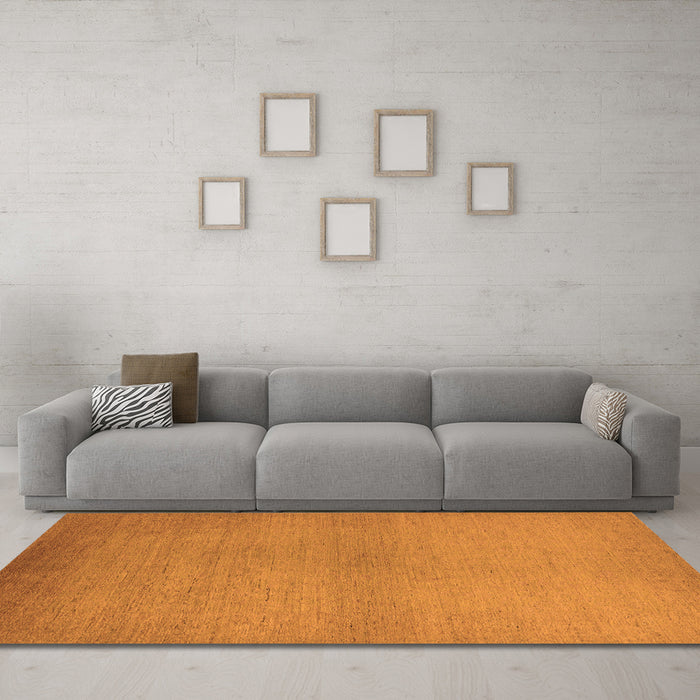 Machine Washable Solid Orange Modern Area Rugs in a Living Room, wshurb1195org