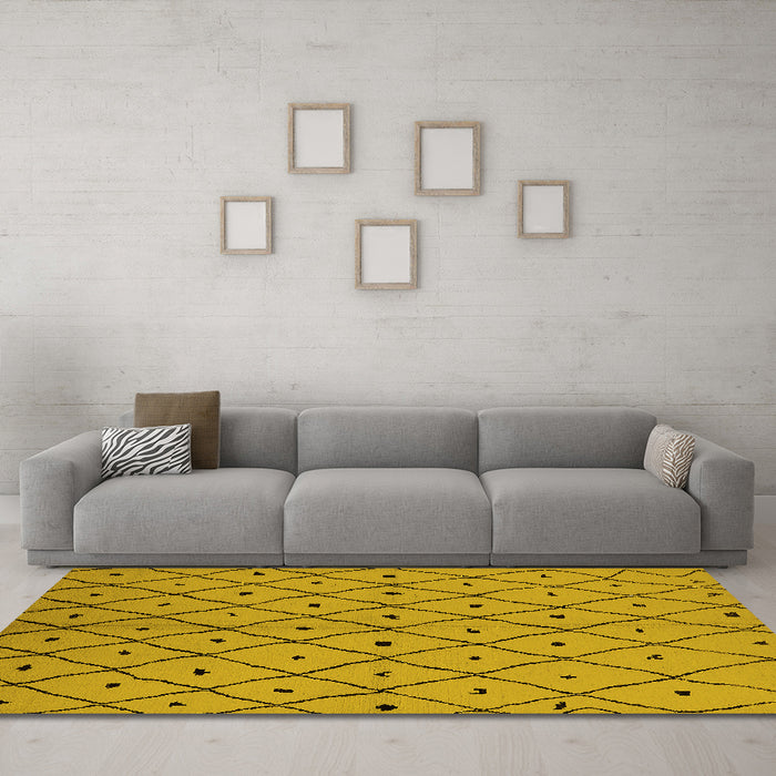 Machine Washable Solid Yellow Modern Rug in a Living Room, wshurb1196yw