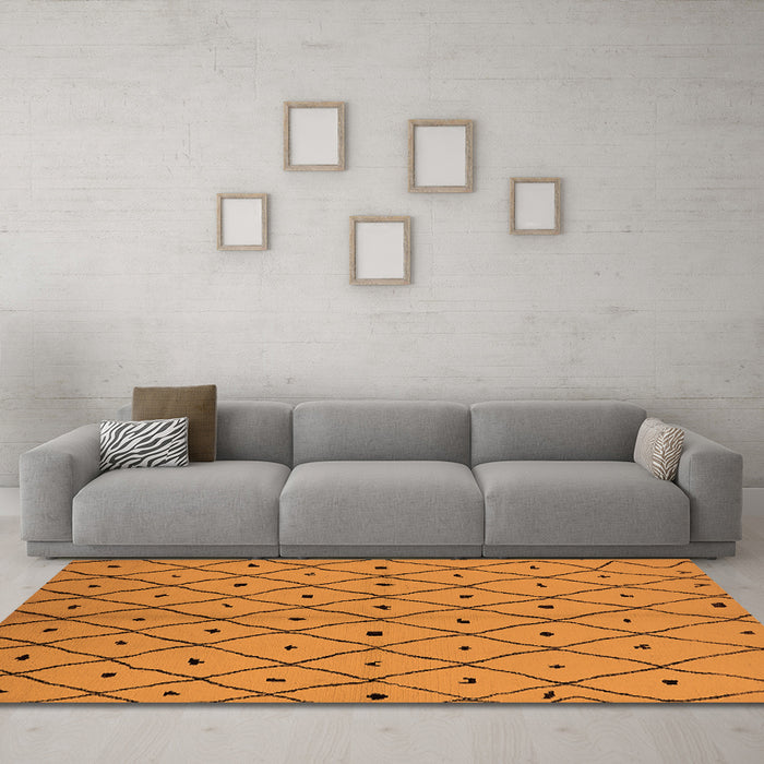 Machine Washable Solid Orange Modern Area Rugs in a Living Room, wshurb1196org