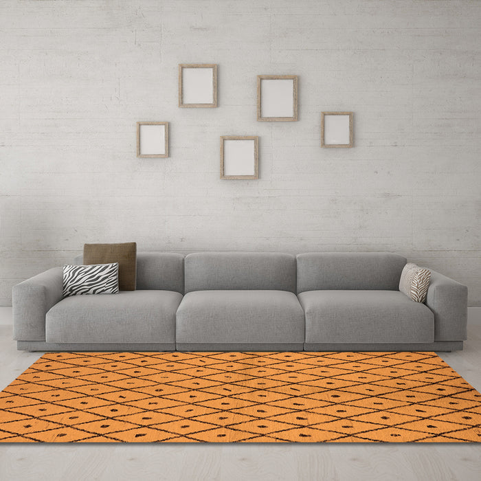 Machine Washable Solid Orange Modern Area Rugs in a Living Room, wshurb1199org