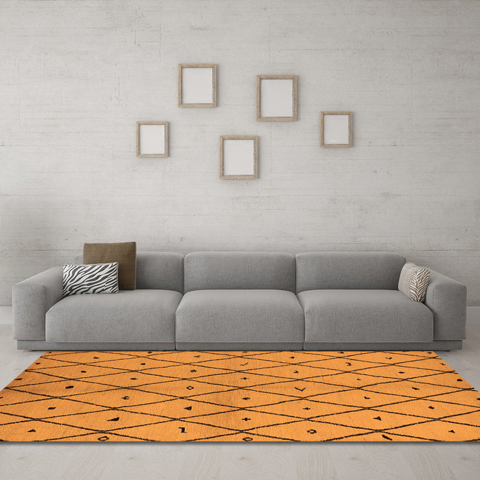 Machine Washable Solid Orange Modern Area Rugs in a Living Room, wshurb1210org