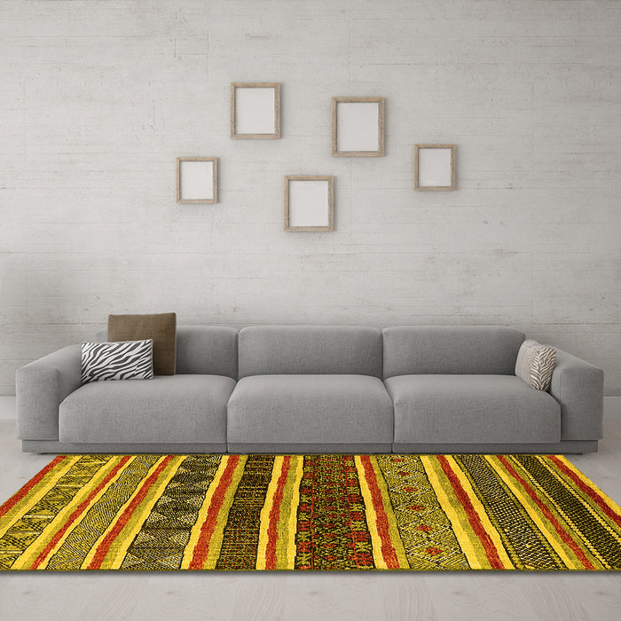 Machine Washable Solid Yellow Modern Rug in a Living Room, wshurb1212yw