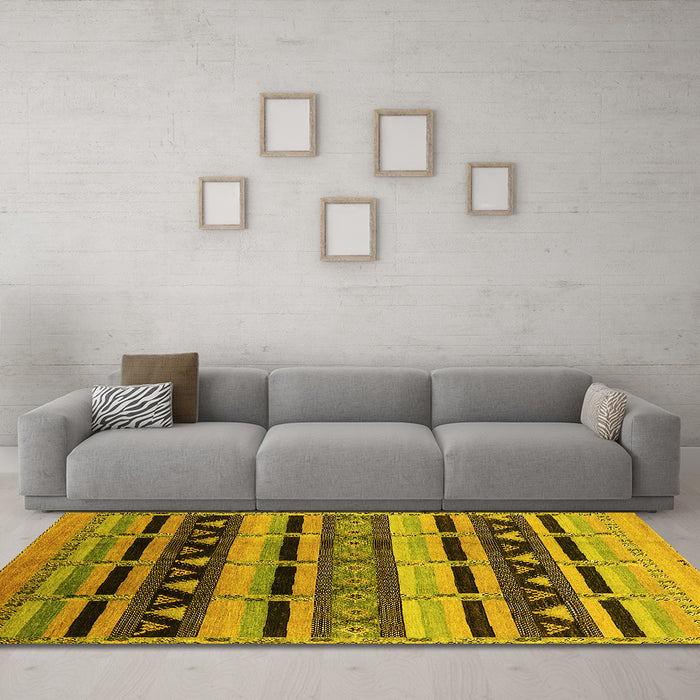 Machine Washable Solid Yellow Modern Rug in a Living Room, wshurb1217yw
