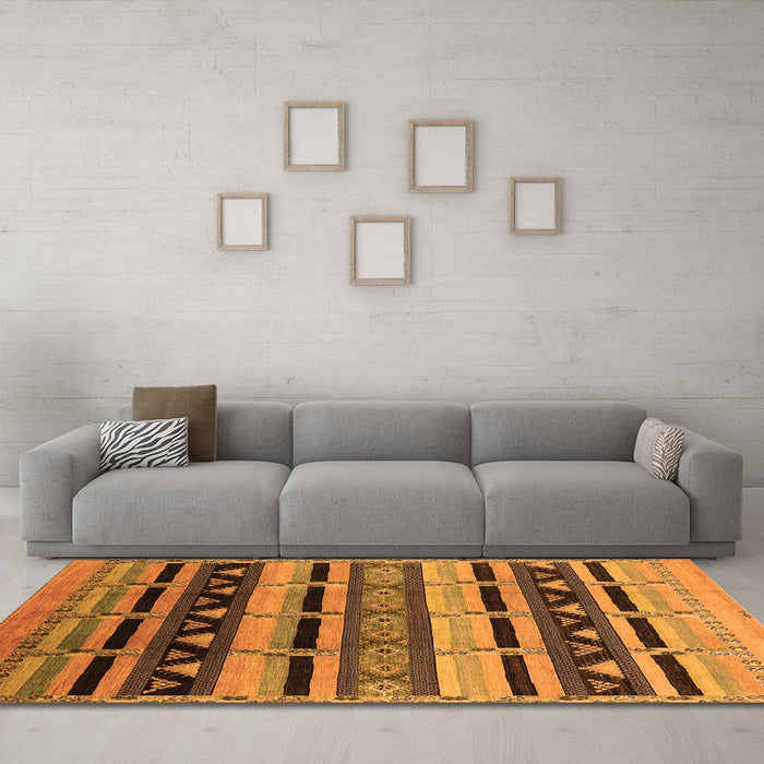 Machine Washable Solid Orange Modern Area Rugs in a Living Room, wshurb1217org