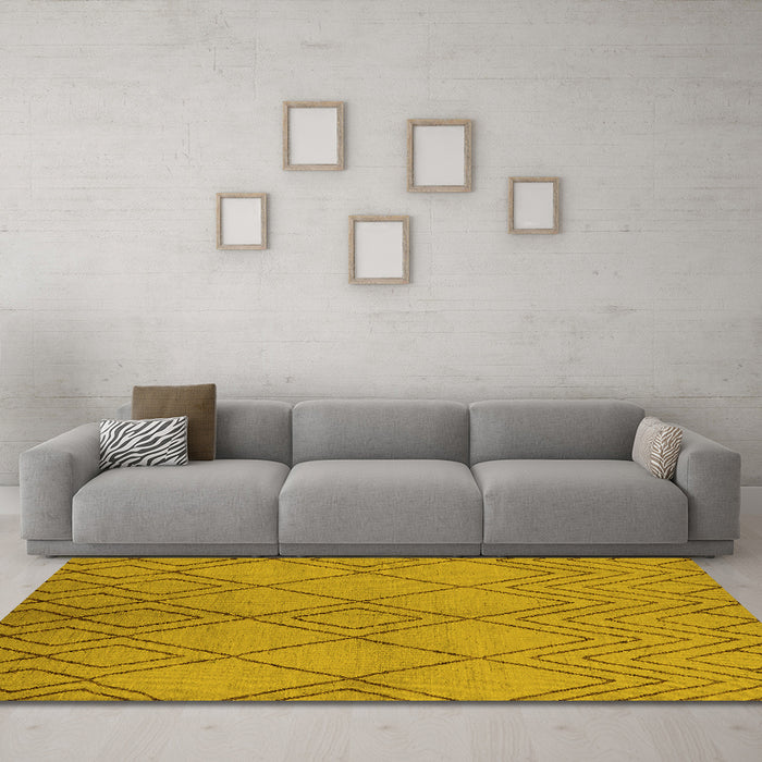 Machine Washable Solid Yellow Modern Rug in a Living Room, wshurb1219yw