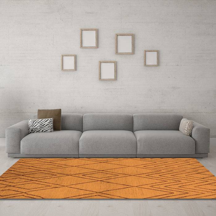 Machine Washable Solid Orange Modern Area Rugs in a Living Room, wshurb1219org