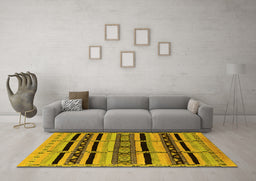 Machine Washable Solid Yellow Modern Rug in a Living Room, wshurb1221yw