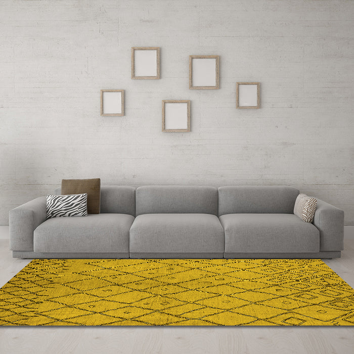 Machine Washable Solid Yellow Modern Rug in a Living Room, wshurb1224yw