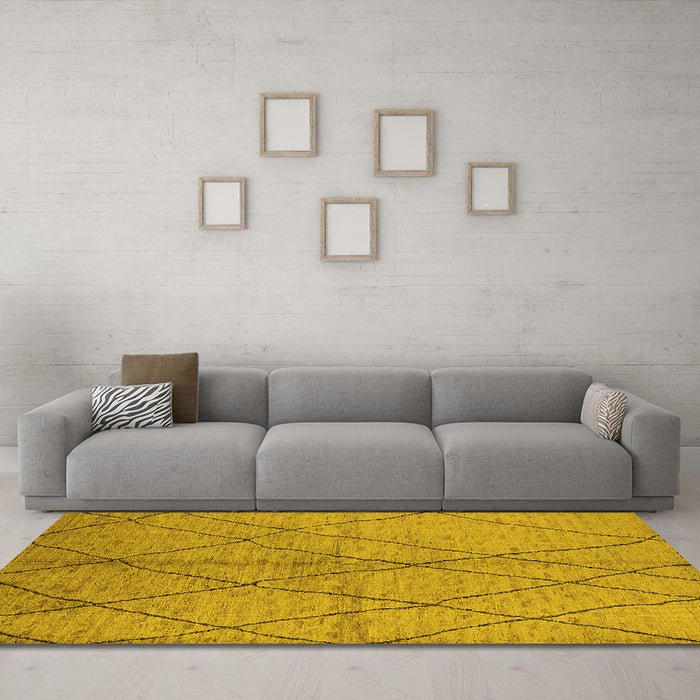 Machine Washable Solid Yellow Modern Rug in a Living Room, wshurb1225yw