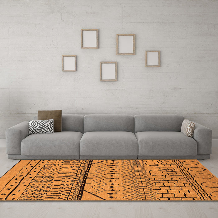 Machine Washable Solid Orange Modern Area Rugs in a Living Room, wshurb1226org