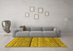 Machine Washable Solid Yellow Modern Rug in a Living Room, wshurb1226yw