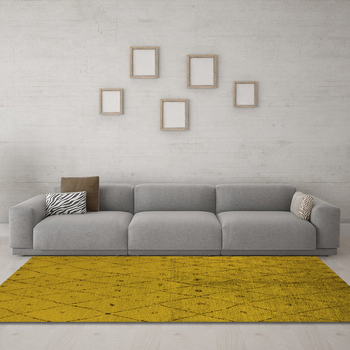 Machine Washable Solid Yellow Modern Rug in a Living Room, wshurb1228yw