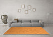 Machine Washable Solid Orange Modern Area Rugs in a Living Room, wshurb1232org