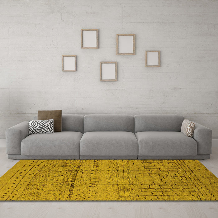 Machine Washable Solid Yellow Modern Rug in a Living Room, wshurb1233yw