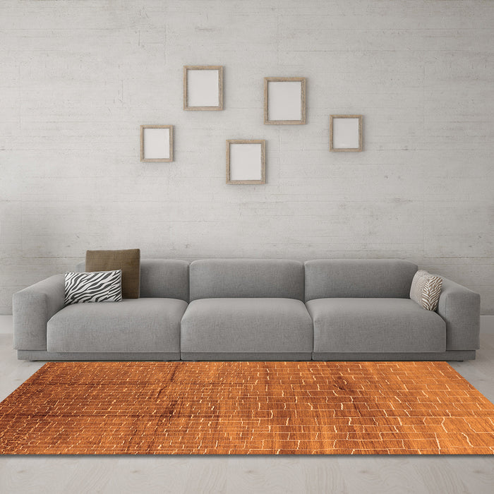 Machine Washable Solid Orange Modern Area Rugs in a Living Room, wshurb1235org