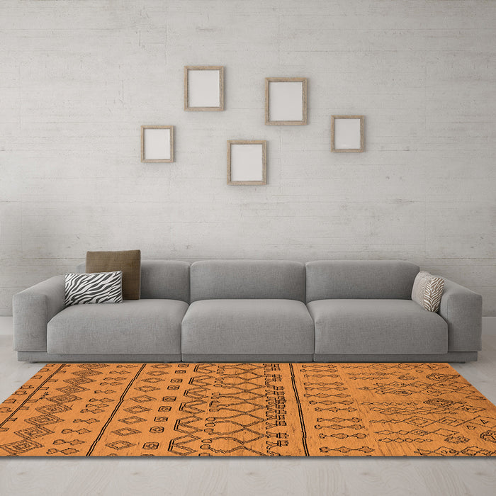 Machine Washable Solid Orange Modern Area Rugs in a Living Room, wshurb1242org