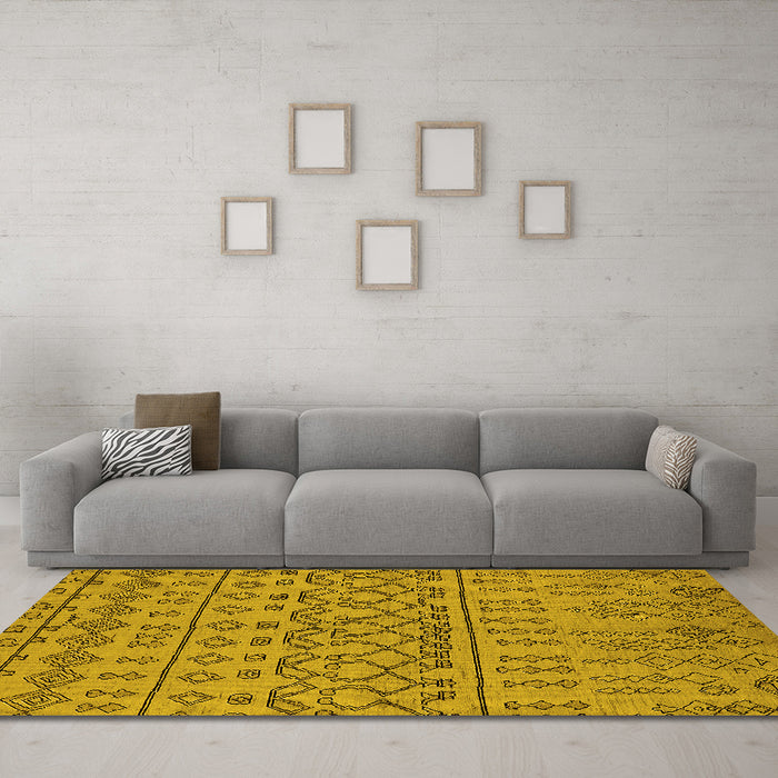 Machine Washable Solid Yellow Modern Rug in a Living Room, wshurb1242yw